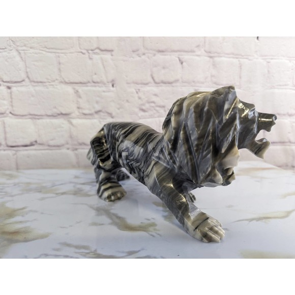 Hand carved striped marble roaring lion abstract sculpture...